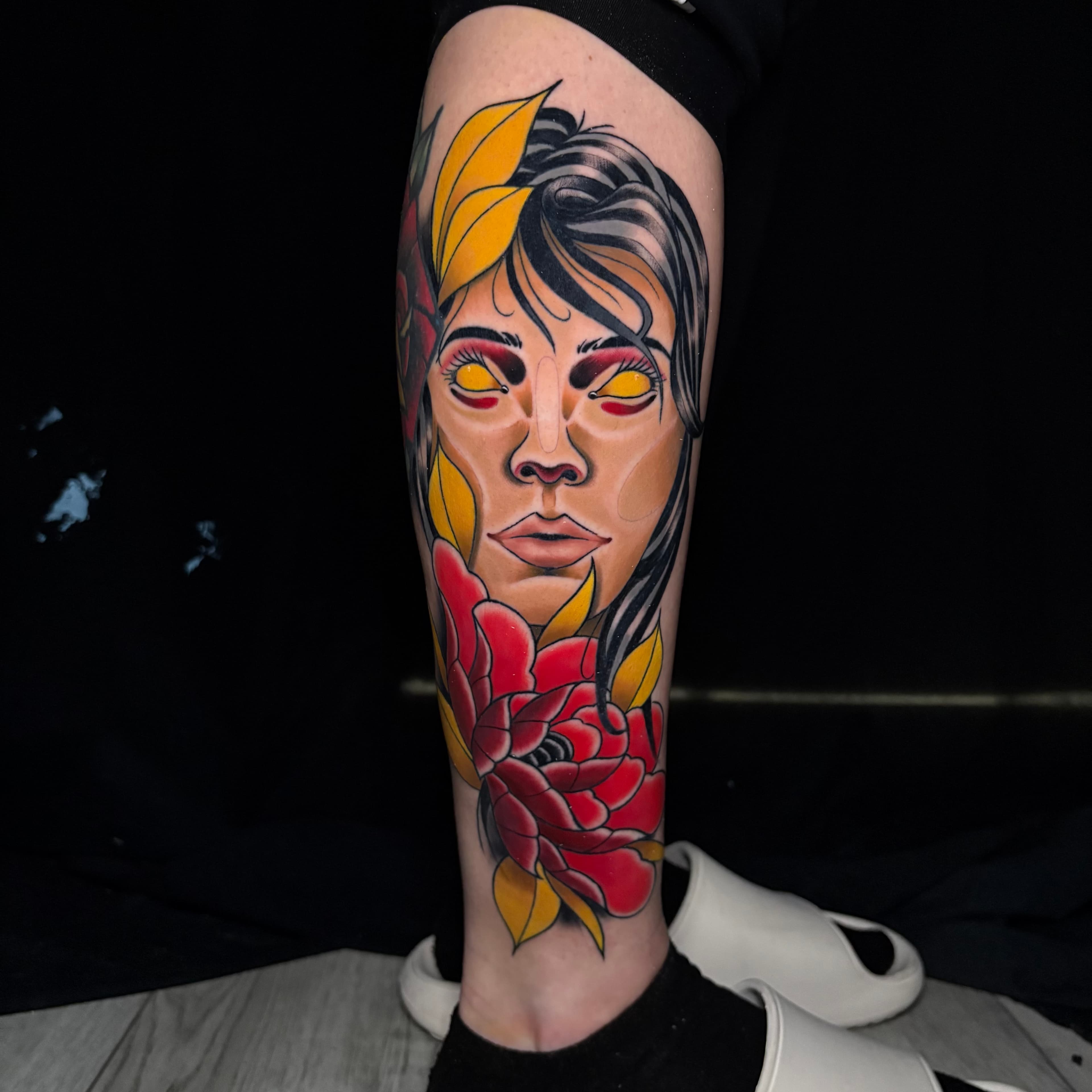 Neotraditional lady face tattoo by Tanner Riggs